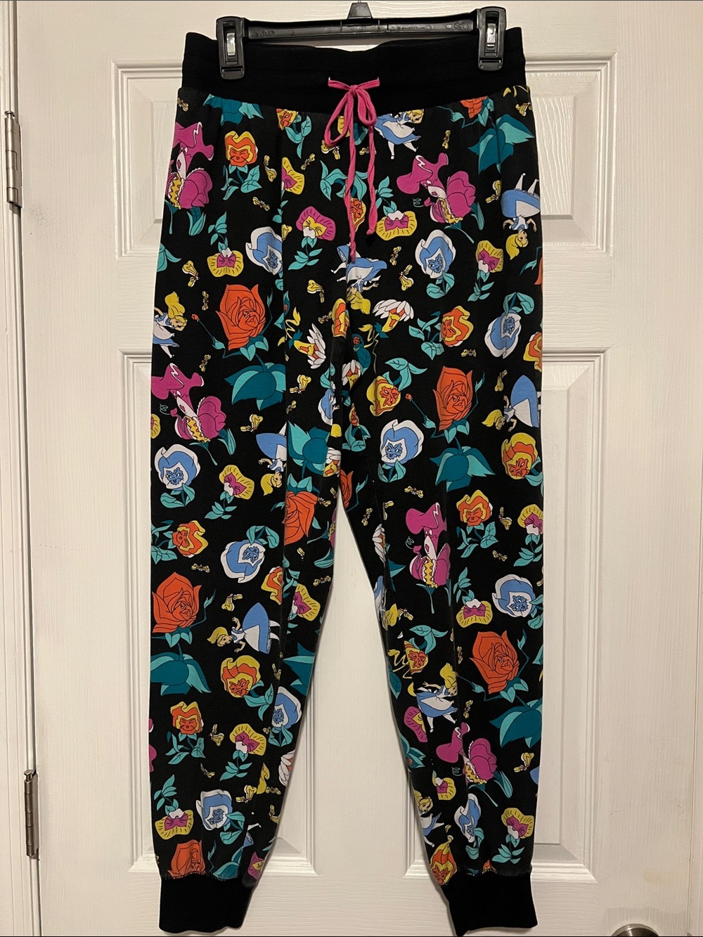 Disney’s Alice in Wonderland Black Floral Track Joggers